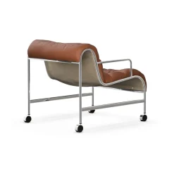 Butaca Sunny con reposabrazos, Piel color coñac con estructura cromada y ruedas*Lammhults Outlet